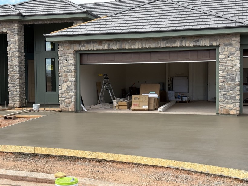 A freshly poured garage apron
