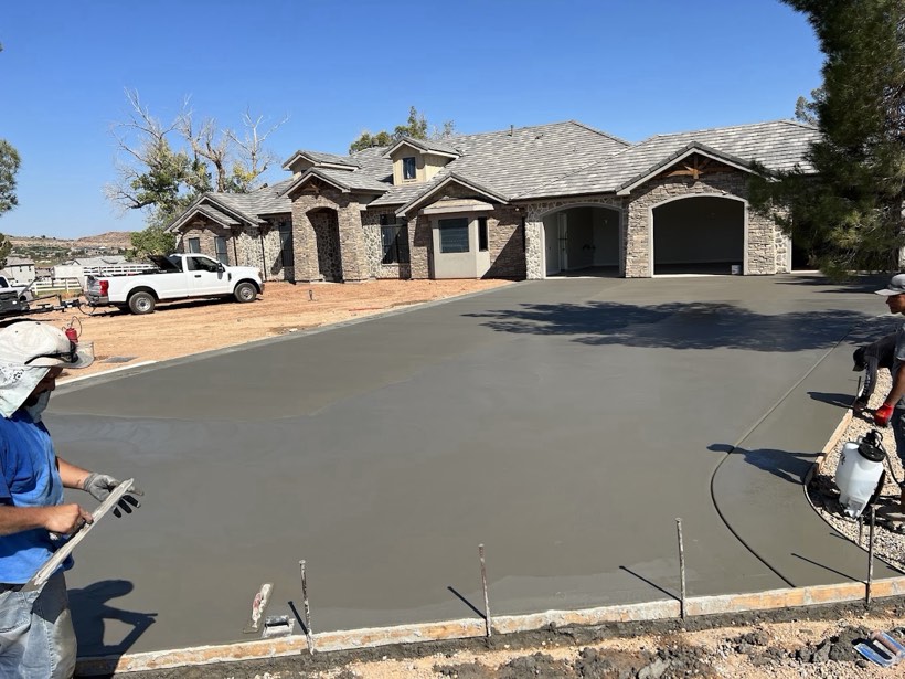 Troweling out a new concrete driveway