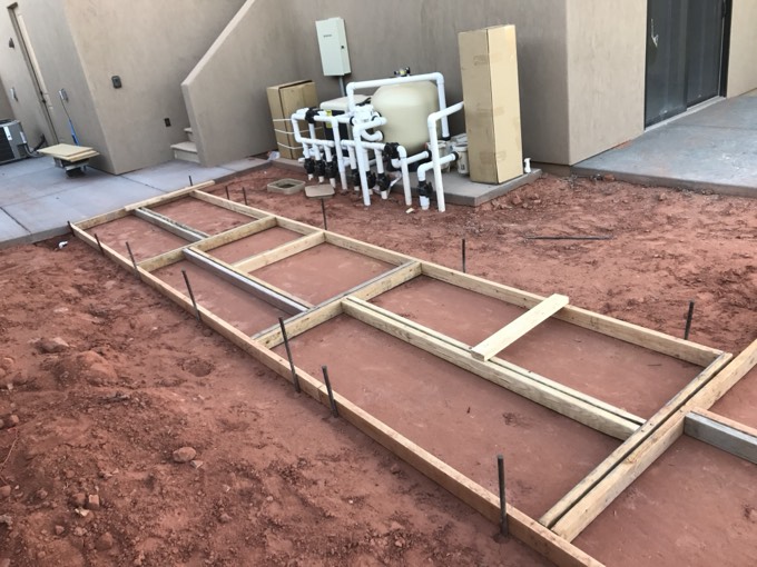 Forms laid out for a separated square driveway