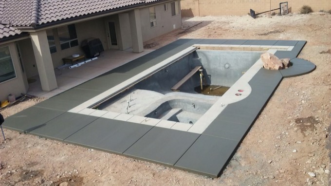 The finished pool deck and coping